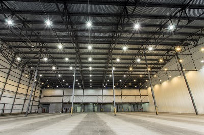 Installed commercial lighting in empty warehouse.