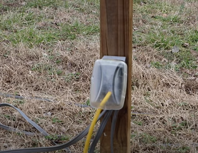 Outdoor Electrical Circuit installed on wood post.